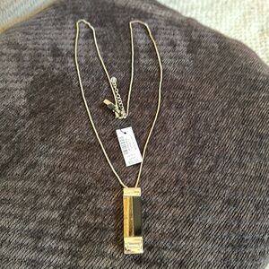 Long adjustable length necklace with rectangular pendant